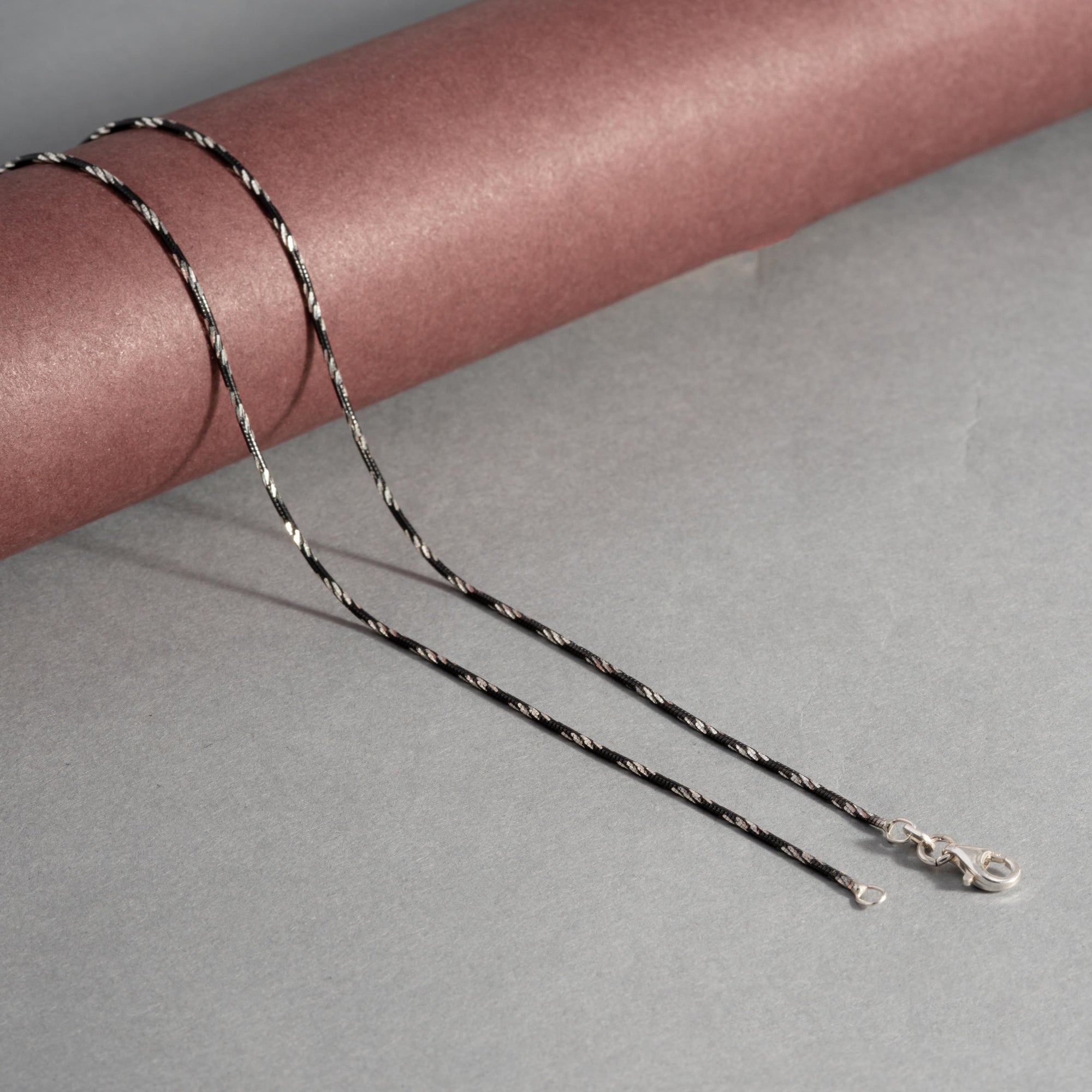 Sleek Black and Silver Anklet