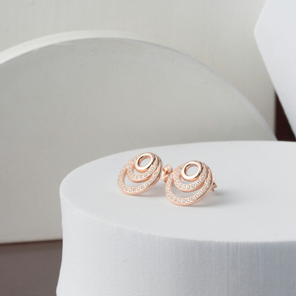 Cubic zirconia spiral dangly earrings