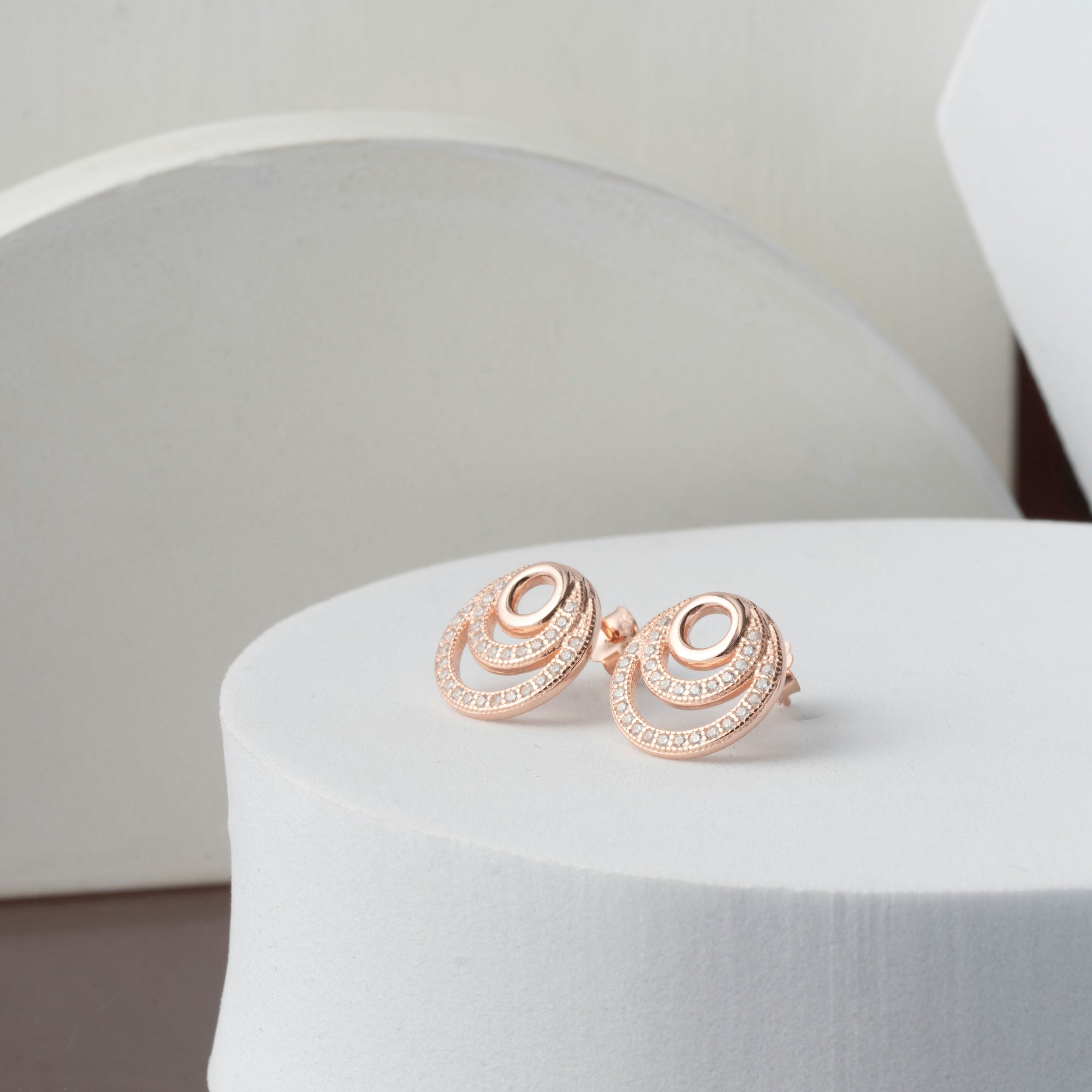 Cubic zirconia spiral dangly earrings