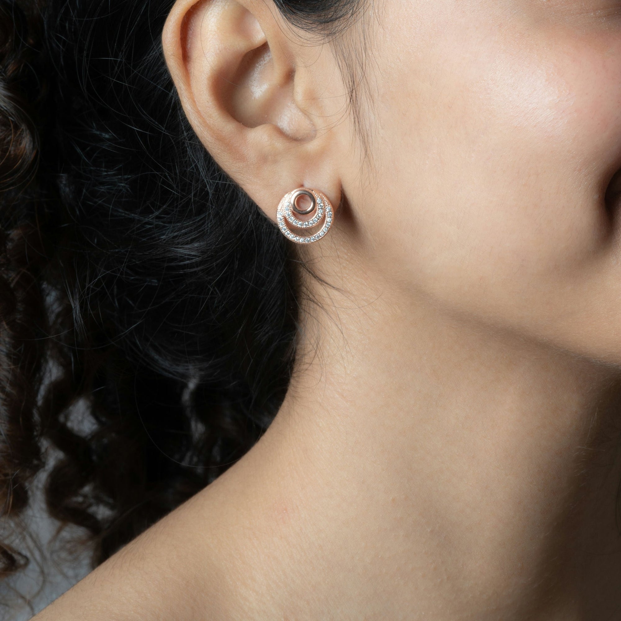 Cubic zirconia spiral dangly earrings