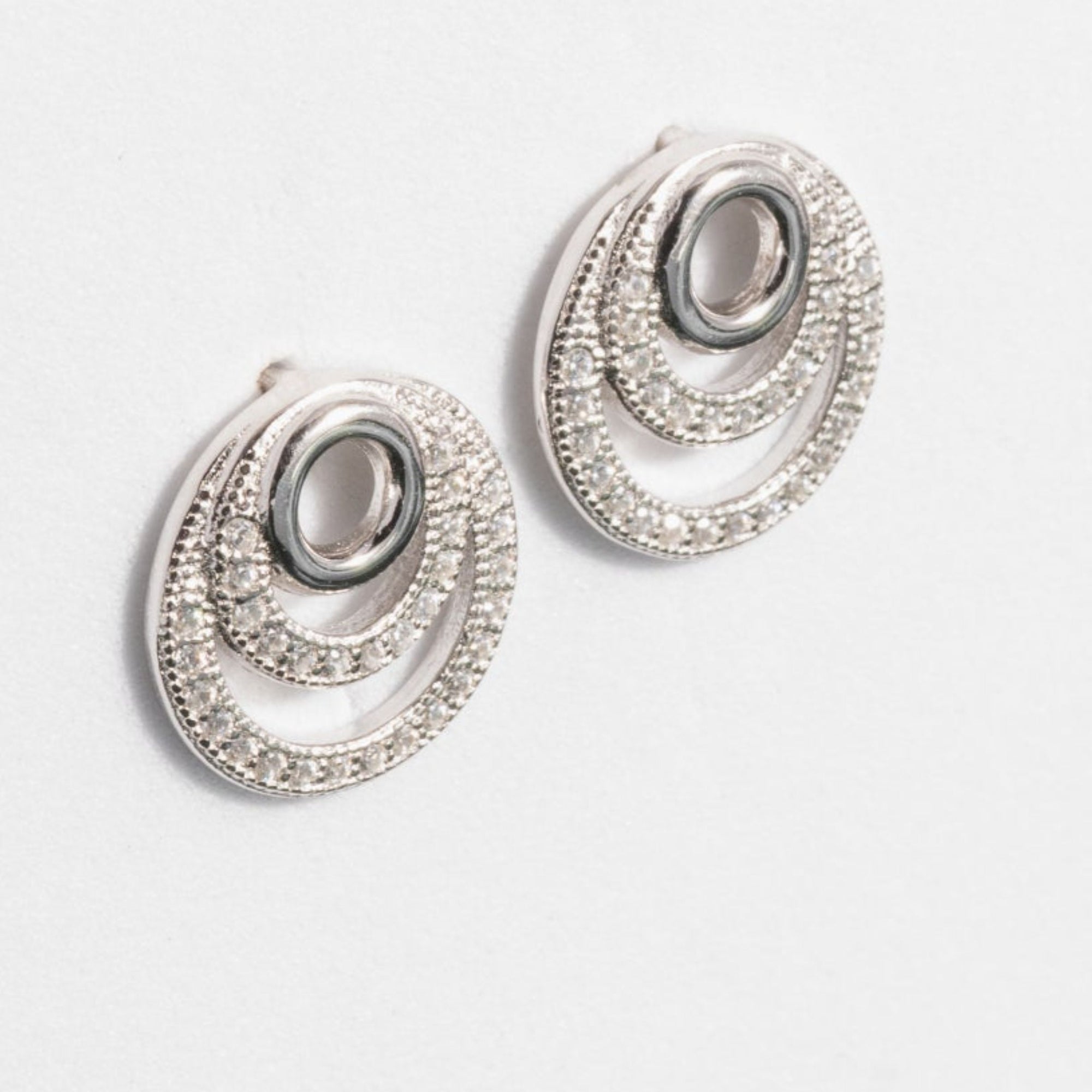Cubic zirconia spiral dangly earrings